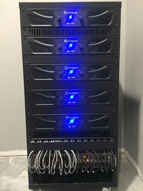 Front of the Gethsemane sanctuary audio rack with five amplifiers and stage input and output connections