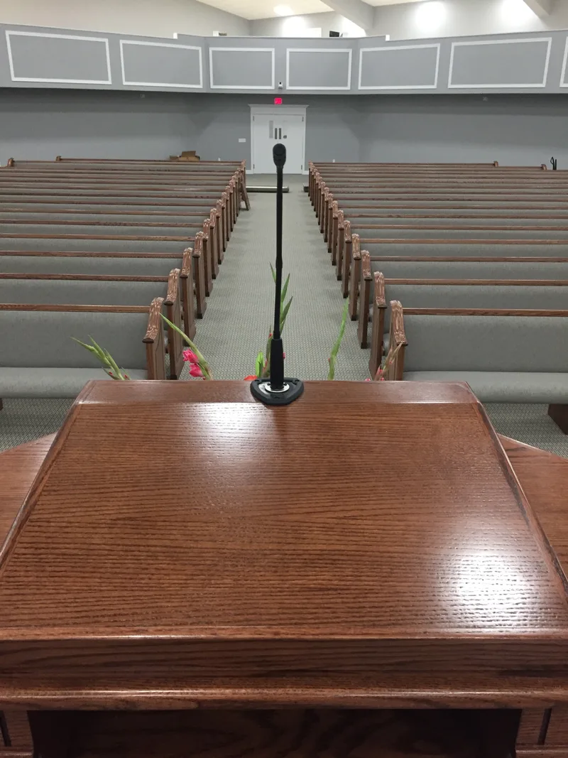 Pulpit microphone overlooking the empty Gethsemane Baptist Church sanctuary