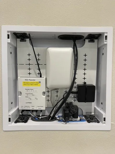 Lutron RadioRA 2 lighting-control interface with repeater, bridge, and ELK integration module